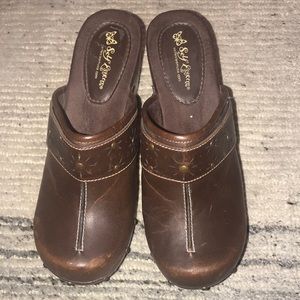 Brown leather clogs